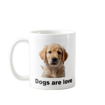 coffee mug that proudly proclaims, "Dogs are love"