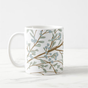 coffee mug with leaves and tree branches