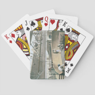 Coiling the telegraph cable in the tanks at the wo playing cards