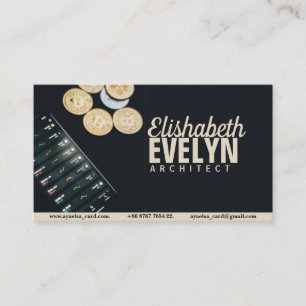 Coins scattered near smartphone with financial business card