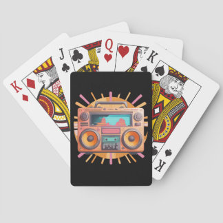 Coloful retro 80s boombox with a sunburst in the. playing cards
