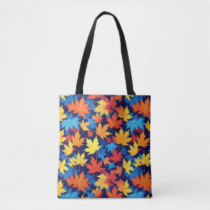 Colorful Autumn Leaves On Dark Blue Background Tote Bag