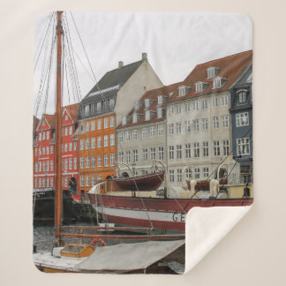 COLORFUL BUILDINGS BESIDE THE RIVER SHERPA BLANKET