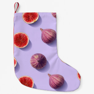 Colorful fruit pattern of fresh figs on purple pas small christmas stocking