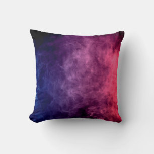 Colorful purple and blue smoke clouds on dark back cushion