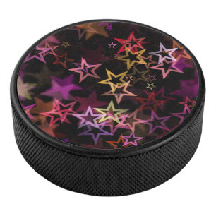 Colorful Stars Dance Whimsically Hockey Puck