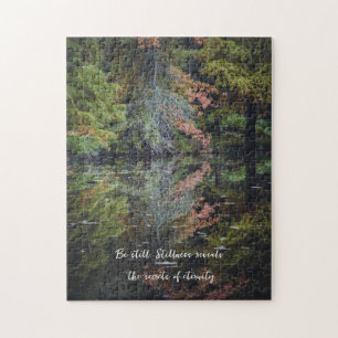Colorful trees reflecting upon the calm water jigsaw puzzle