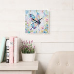 Colorful Watercolor Butterfly Floral Square Wall Clock<br><div class="desc">Add a touch of elegance and whimsy with this beautiful watercolor butterfly illustration featuring soft pastel colors and delicate floral accents. The butterfly’s vibrant wings blend shades of blue,  pink,  purple,  and gold,  creating a dreamy and artistic composition inspired by nature and springtime gardens.</div>