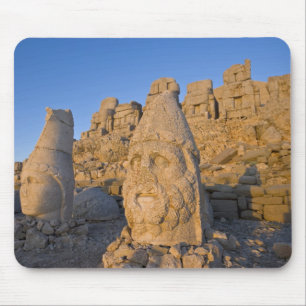 Colossal head statues of Gods guarding the Mouse Pad