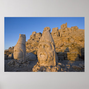 Colossal head statues of Gods guarding the Poster