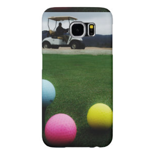 coloured golf balls and cart