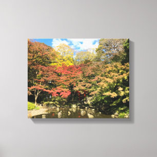 Coloured Maple Trees by Pond Canvas Print
