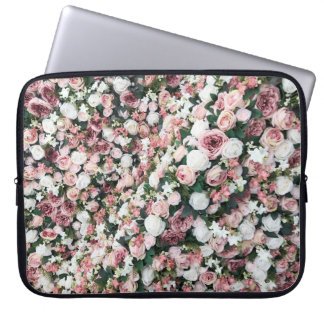 Colourful artificial flowers: vibrant background laptop sleeve