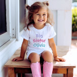 Colourful Big Sister Monogram Name White T-Shirt<br><div class="desc">She will love announcing her new role with this white tee featuring "Big Sister" in bold, colourful typography and a customisable name below. The cheerful multicolor lettering is perfect for pregnancy reveals, baby shower celebrations, and hospital photos with the newest family member. A personalised monogram keepsake she will treasure as...</div>