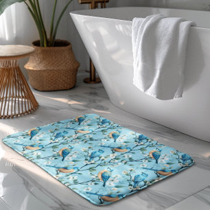Colourful birds and white botanical flowers patter bath mat
