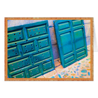 Colourful blue doors on sidewalk.