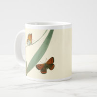 Colourful Butterflies Fluttering Around a Leaf