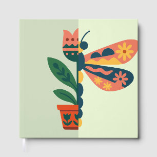 Colourful butterfly decoration with floral element guest book