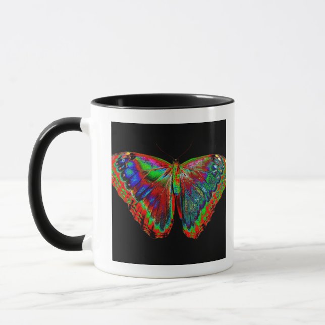 Colourful Butterfly design against black backdrop Mug (Left)