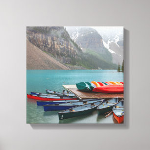 Colourful Canoes at Moraine Lake Canvas Print