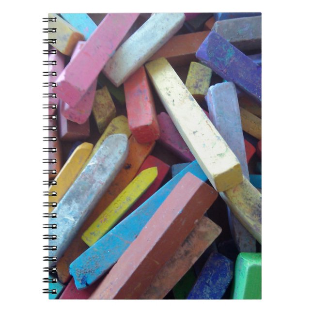 colourful chalks grouped together notebook (Front)