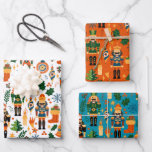 Colourful Christmas Pattern With Nutcrackers Wrapping Paper Sheet<br><div class="desc">Cute and colourful Christmas nutcrackers with other holiday symbols in a seamless pattern on a white background.</div>