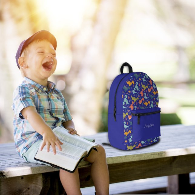 Colourful dinosaur cartoon cute pattern blue name  printed backpack (Creator Uploaded)