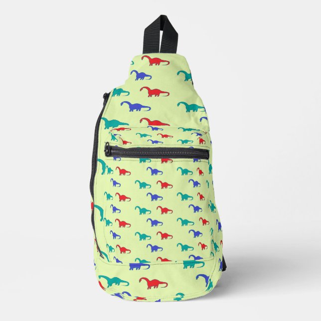 Colourful dinosaurs pattern on green sling bag (Front)