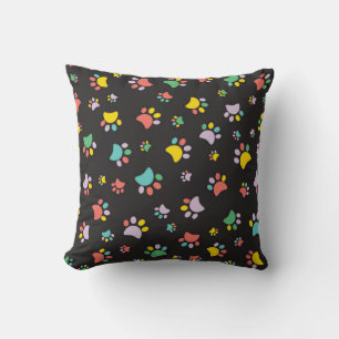 Colourful dog paws pattern cushion