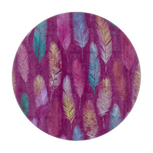 Colourful feathers: purple background pattern. cutting board