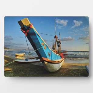 Colourful Fishing Boat By The Ocean Plaque