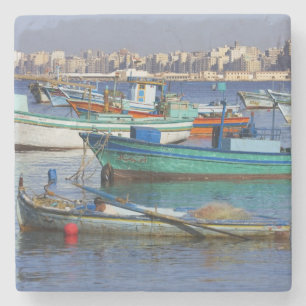 Colourful fishing boats in the Harbour of Stone Coaster