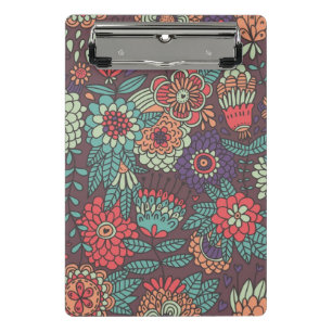 Colourful floral pattern in cartoon style mini clipboard