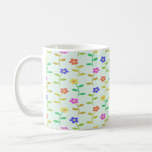 Colourful flowers on pale green coffee mug
