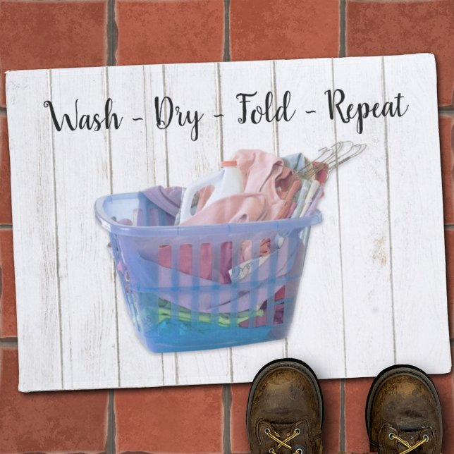 Colourful Folded Laundry On Hangers In Blue Basket Doormat (Creator Uploaded)