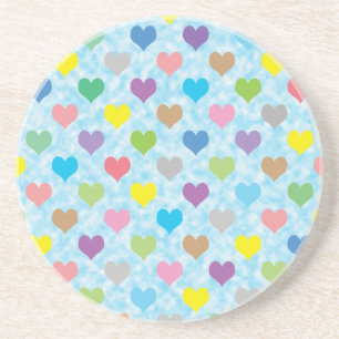 Colourful hearts pattern on blue background coaster