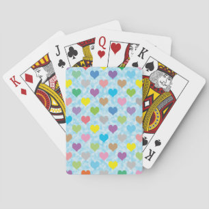 Colourful hearts pattern on blue background playing cards