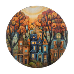 Colourful houses and trees in the fall cutting board
