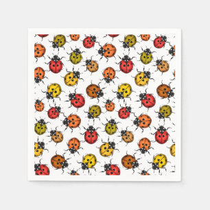 Colourful ladybugs on white napkin