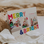 Colourful Merry and Bright Folded Three Photo Holiday Card<br><div class="desc">Capture the joy and magic of the holiday season with this unique and festive, colourful merry and bright folded three photo holiday card. Its simple yet fun design features a rainbow colour palette of red, green, yellow, blue, orange, and pink, creating a vibrant and cheerful atmosphere. The creative and minimalist...</div>