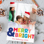 Colourful Merry and Bright Full Vertical Photo Holiday Card<br><div class="desc">Capture the joy and magic of the holiday season with this unique and festive, colourful merry and bright full vertical photo holiday card. Its simple yet fun design features a rainbow colour palette of red, green, yellow, blue, orange, and pink, creating a vibrant and cheerful atmosphere. The creative and minimalist...</div>