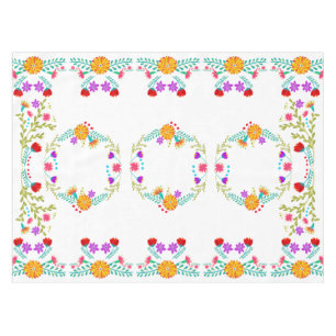 Colourful Mexican Fiesta Flowers on White Tablecloth