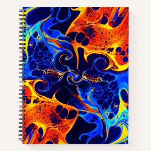 colourful mix of neon paints swirling on black notebook