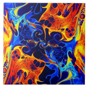 colourful mix of neon paints swirling on black   tile