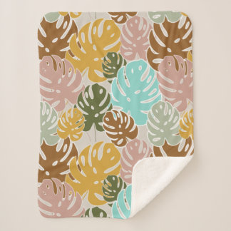 Colourful monstera jungle sherpa blanket