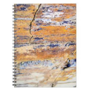 Colourful natural stone wall pattern in a quarryan notebook