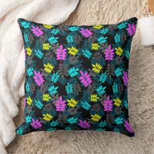 colourful neon rowan leaves on black cushion