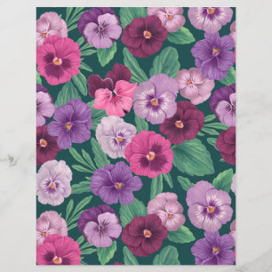Colourful pansies on dark greenish blue