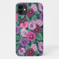 Colourful pansies on dark greenish blue