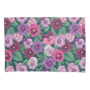 Colourful pansies on dark greenish blue pillowcase
